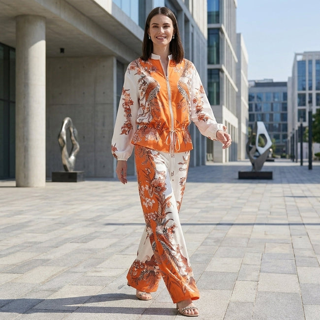 Elegant floral wide-leg two-piece women's co-ord set by FJØRNA, styled in a lifestyle setting with vibrant patterns.