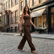 FJØRNA elegant two-piece women's co-ord set with wide-leg pants, styled in a casual outdoor setting.