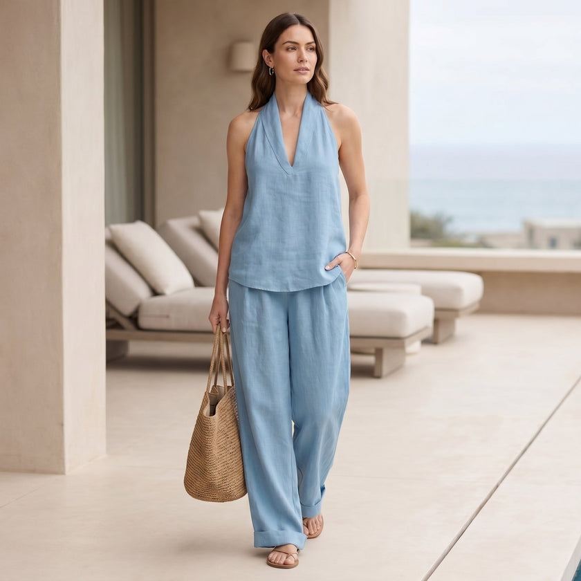 FJØRNA women's summer two-piece co-ord set with V-neck top and matching shorts, featuring pockets, lightweight fabric, casual style.