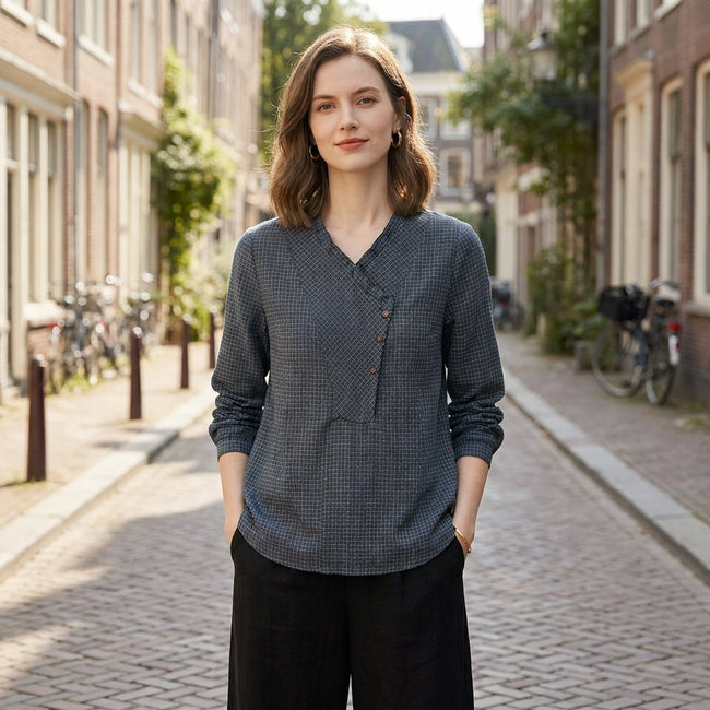FJØRNA summer blouse for women, geometric long sleeve top worn outdoors, featuring a stylish pattern and lightweight fabric.