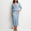 Light blue satin two-piece women's co-ord set by FJØRNA featuring flowy design and elegant fit.