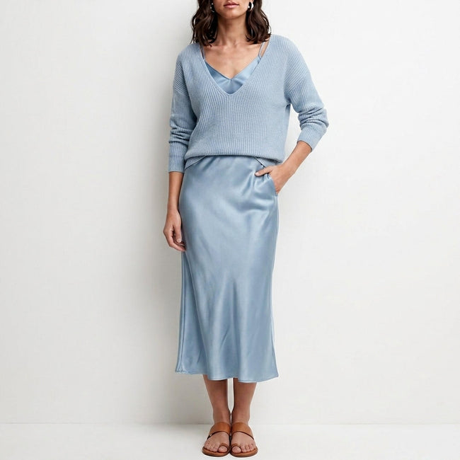 Light blue satin two-piece women's co-ord set by FJØRNA featuring flowy design and elegant fit.
