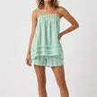 Light green women's summer two-piece striped smocked co-ord set by FJØRNA, featuring a sleeveless top and matching skirt.