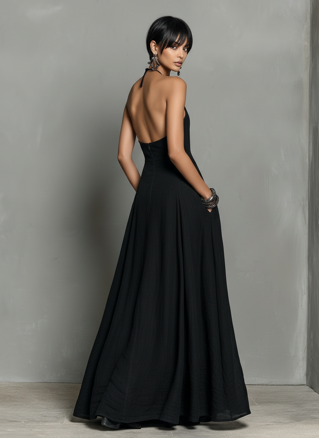 Linen halter neck maxi dress for women by FJØRNA, featuring a flowing design and sleeveless style in natural linen fabric.