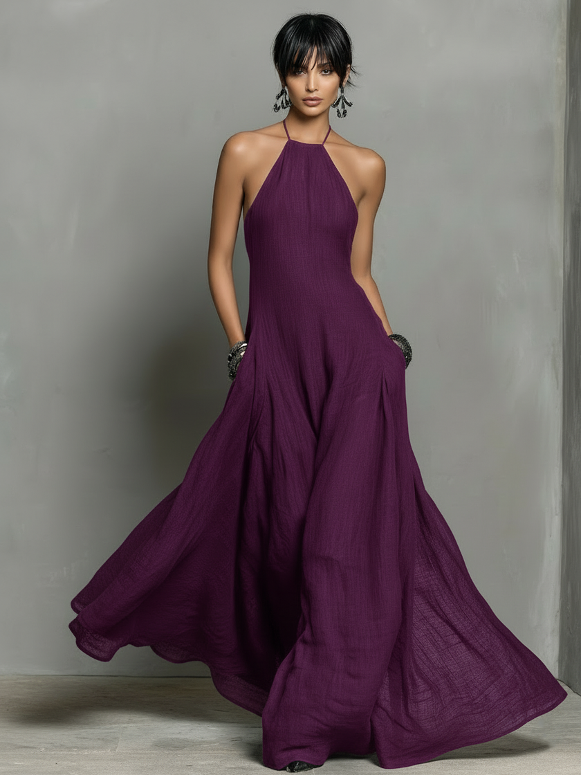FJØRNA linen halter neck maxi dress for women featuring a flowy silhouette and sleeveless design for warm weather.
