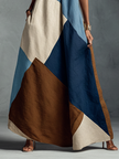 FJØRNA linen patchwork maxi dress with casual, flowing design, featuring mixed fabric patterns and a relaxed fit.