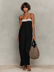 FJØRNA linen strapless maxi dress shown in a flowing, elegant evening dress style with a relaxed fit and natural fabric texture.