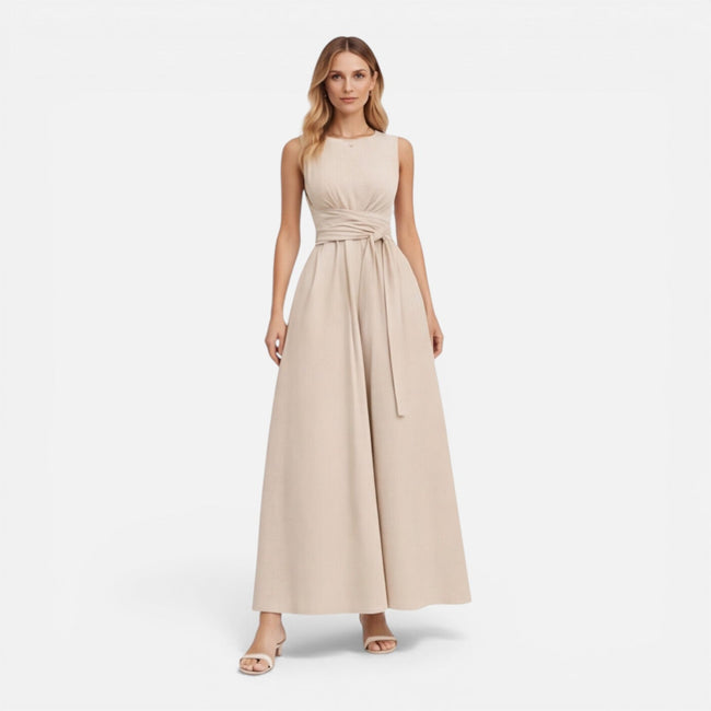 Elegant women's summer maxi dress by FJØRNA with twist waist design and sleeveless style, perfect for warm weather.