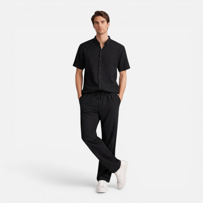 Men's casual 2-piece set by FJØRNA featuring short sleeve shirt and matching pants, ideal for relaxed everyday wear.