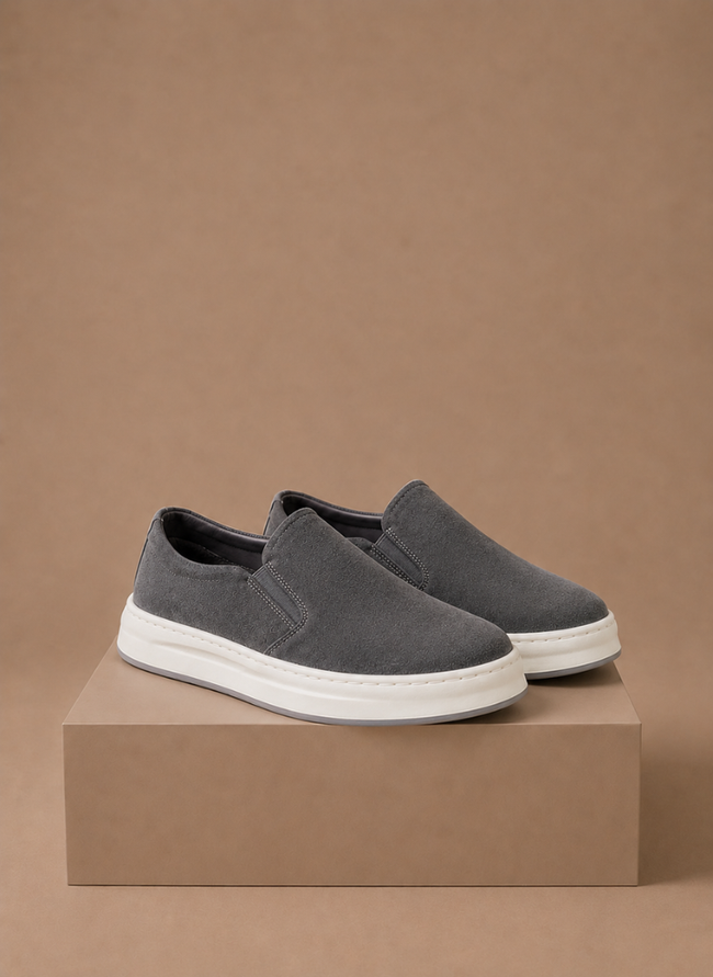 Men's suede slip-on sneakers by FJØRNA featuring casual everyday loafer style, with a sleek, comfortable design.