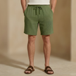 Men's textured relaxed-fit drawstring shorts by FJØRNA, casual summer shorts in lightweight fabric, styled for comfort.