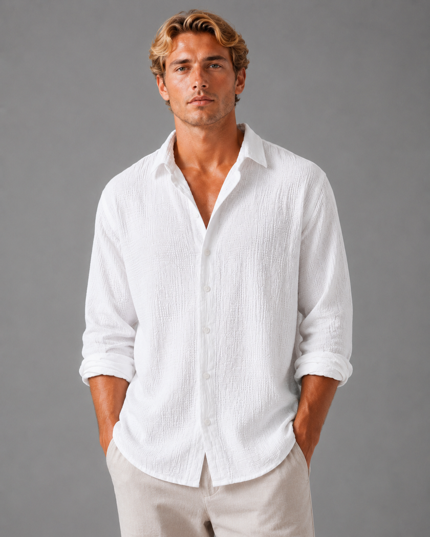 Men's linen-look textured button-up shirt in relaxed summer fit by FJØRNA, shown on a male model.