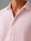 Men's linen-look textured button-up shirt in relaxed summer fit by FJØRNA, suitable for casual warm-weather wear.