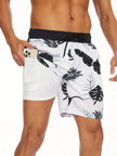 Men's FJØRNA swim shorts with vibrant multi-print design and integrated compression liner for comfort and support.
