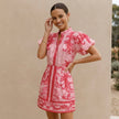 Elegant two-piece linen floral co-ord set for women by FJØRNA, featuring a cropped top and matching wide-leg pants.