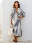 FJØRNA women's summer midi dress with long sleeves and navy and white stripes, casual and stylish for warm weather.