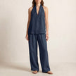 Navy blue women's summer two-piece co-ord set by FJØRNA with V-neck top and matching lightweight pants, featuring side pockets.