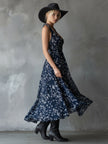 Navy blue chiffon floral maxi dress for women by FJØRNA, flowing fabric with a floral pattern and elegant design.