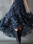 Navy blue chiffon floral maxi dress for women by FJØRNA, flowing fabric with a floral pattern and elegant design.