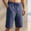 Navy blue men's linen chino shorts with drawstring waist and tailored fit, casual summer pants by FJØRNA.