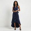 Navy blue FJØRNA elegant maxi dress for women featuring a halter neck and ruffle satin fabric, perfect for formal occasions.