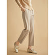 Women's wool tapered trousers by FJØRNA, made from soft merino wool, showcasing a stylish and comfortable fit.
