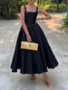FJØRNA off-shoulder strapless sleeveless women's maxi dress with flowing fabric and elegant design, perfect for formal occasions.