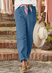 Lightweight summer women's trousers by FJØRNA, high waist, breathable fabric, perfect for warm weather and casual wear.