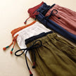 FJØRNA women's lightweight summer ankle-length trousers, breathable and stylish for warm weather, shown in natural fabric and fit.