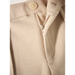 Women's wool tapered trousers by FJØRNA, stylish merino wool pants with a fitted, tapered design for a modern look.
