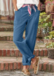 FJØRNA women's lightweight summer trousers with high waist, breathable fabric, and relaxed fit for comfortable warm-weather wear.