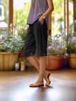 FJØRNA lightweight summer women's shorts with elastic waist and side pockets, casual and comfortable for warm weather.