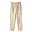Women's wool tapered trousers by FJØRNA, Merino wool pants for women, featuring a tailored fit and tapered leg design.