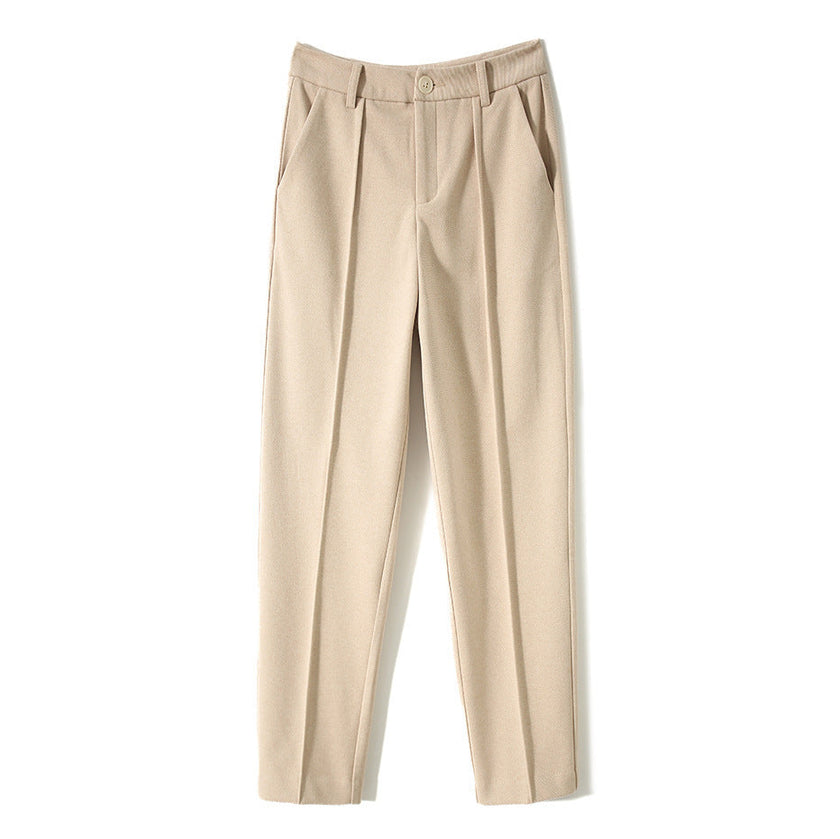 Women's wool tapered trousers by FJØRNA, Merino wool pants for women, featuring a tailored fit and tapered leg design.