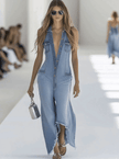 Light blue denim sleeveless jumpsuit by FJØRNA featuring raw edge details and wide-leg pants for women.