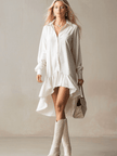 FJØRNA white denim ruffle midi dress with sleeveless design, fitted waist, and flowing skirt perfect for evening occasions