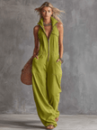 Bright green FJØRNA women's cotton linen zip-front jumpsuit with long sleeves and front zipper, styled as casual pants.