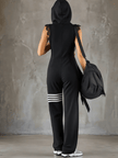 Black striped sleeveless hooded jumpsuit for women from FJØRNA, featuring a stylish hood and comfortable pant design.