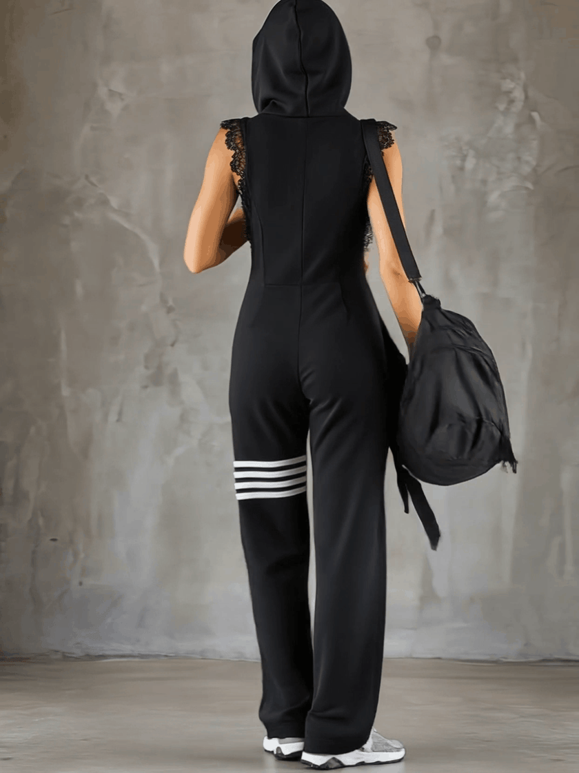 Black striped sleeveless hooded jumpsuit for women from FJØRNA, featuring a stylish hood and comfortable pant design.