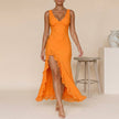 Orange FJØRNA elegant sleeveless maxi dress with V-neck for women, flowing and stylish for summer or special occasions.