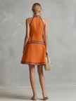 Orange linen sleeveless mini dress by FJØRNA, elegant evening dress with a stylish, sleeveless design and modern mini length.