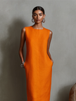 Orange linen sleeveless mini dress for women by FJØRNA, showing a stylish evening dress with a sleeveless design and fitted silhouette.
