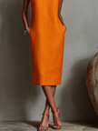 Orange linen sleeveless mini dress for women by FJØRNA, featuring a stylish evening dress design and sleeveless silhouette.