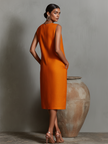 Orange linen sleeveless mini dress for women by FJØRNA, featuring a stylish evening dress design with a fitted silhouette.