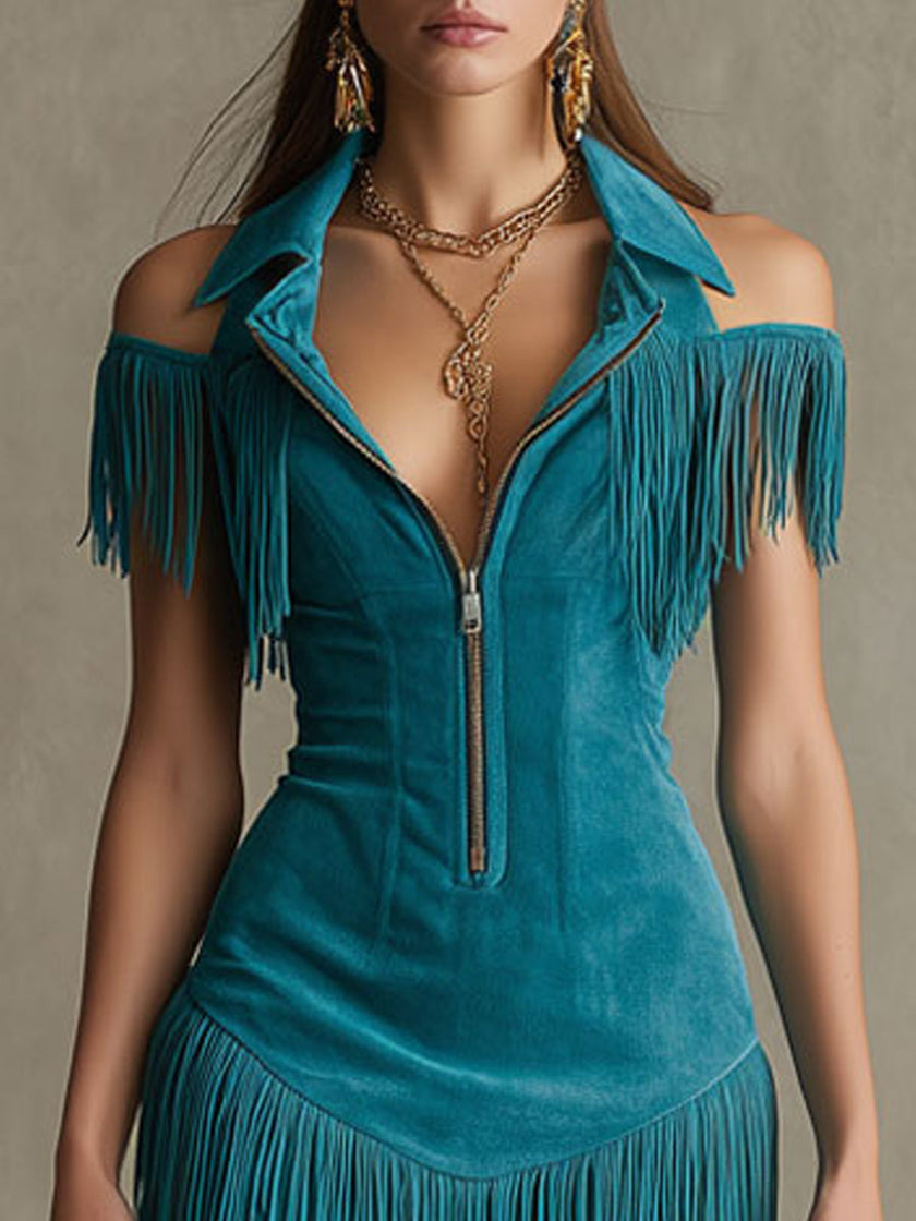 Peacock blue faux suede tassel mini dress by FJØRNA, casual style with tassel accents and fitted silhouette, shown on a model.