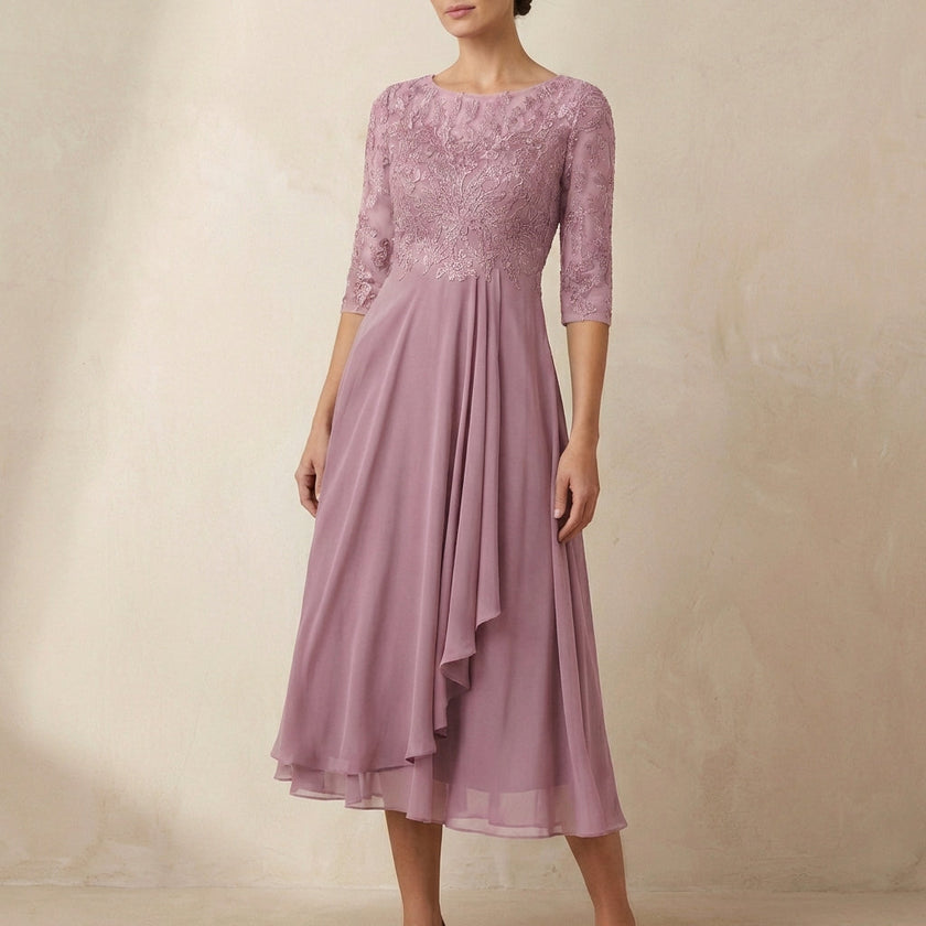 Pink FJØRNA elegant midi bodycon chiffon dress for women, showcasing a fitted silhouette and flowing fabric.
