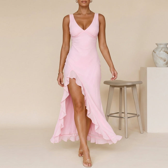 Pink FJØRNA elegant maxi dress for women with a V-neck and sleeveless design, perfect for stylish occasions.