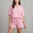 Pink FJØRNA summer two-piece women's co-ord set with drawstring details, featuring a matching top and shorts for casual wear.