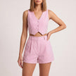 Pink FJØRNA women's two-piece co-ord set with pleated V-neck top and matching skirt, stylish and elegant for casual or dressy occasions.