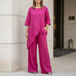 Pink summer two-piece women's co-ord set by FJØRNA featuring an asymmetric top and matching shorts.